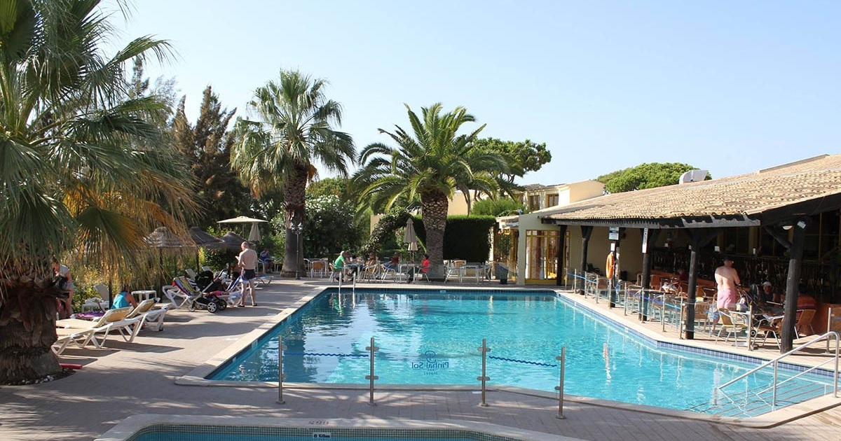 Outdoor pool and gardens at Hotel Pinhal do Sol, Quarteira