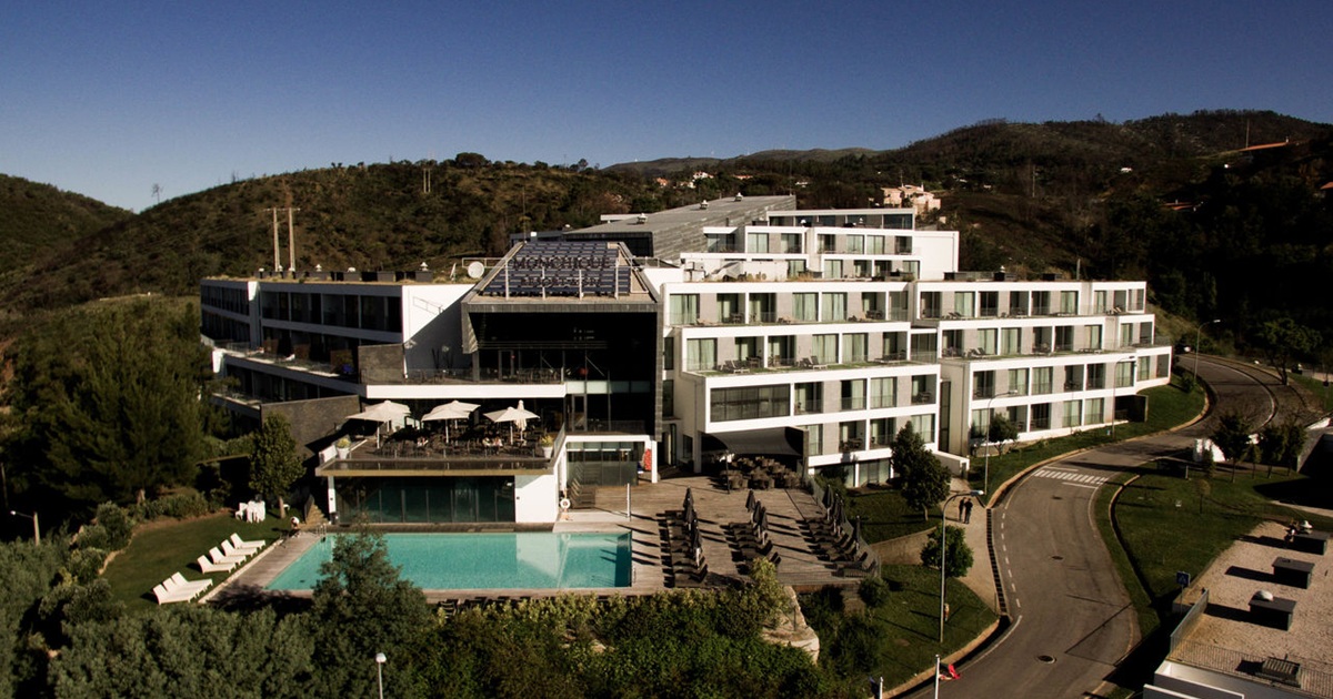 Monchique Resort & Spa terraced exterior, pool, and Serra hills at Lugar do Montinho